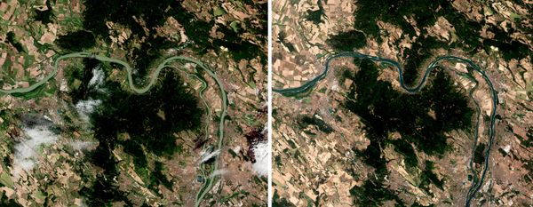 На снимках со спутника Copernicus Sentinel-2 показан участок реки Дунай примерно в 45 км к северу от венгерской столицы Будапешта.Слева — спутниковый снимок от 9 августа 2025 года, на котором река протекает через летний пейзаж с желтыми и зелеными полями. На снимке справа — тот же участок реки 4 августа 2026 года, где уровень Дуная заметно ниже, видны песчаные отмели, а местность гораздо суше.